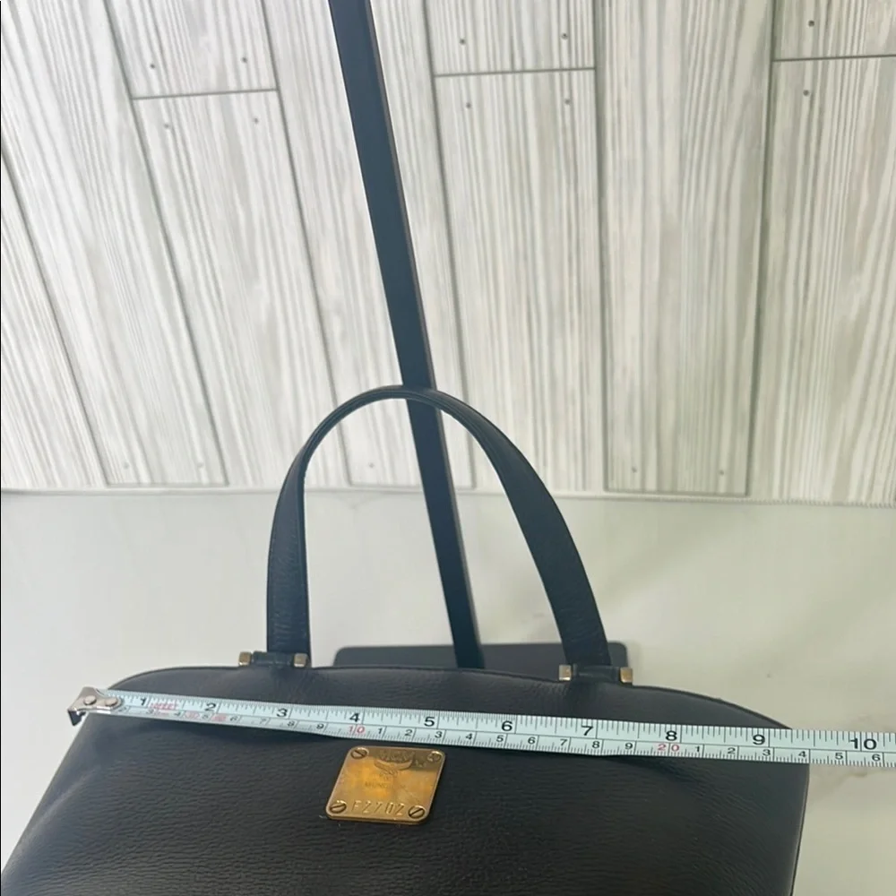 MCM Black Mini Tote with Gold Accents and Trapezoid Shape